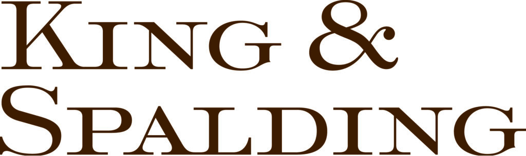 The text King in capital letters followed by the ampersand symbol stacked on top of the name Spalding in capital letters in brown serif font.